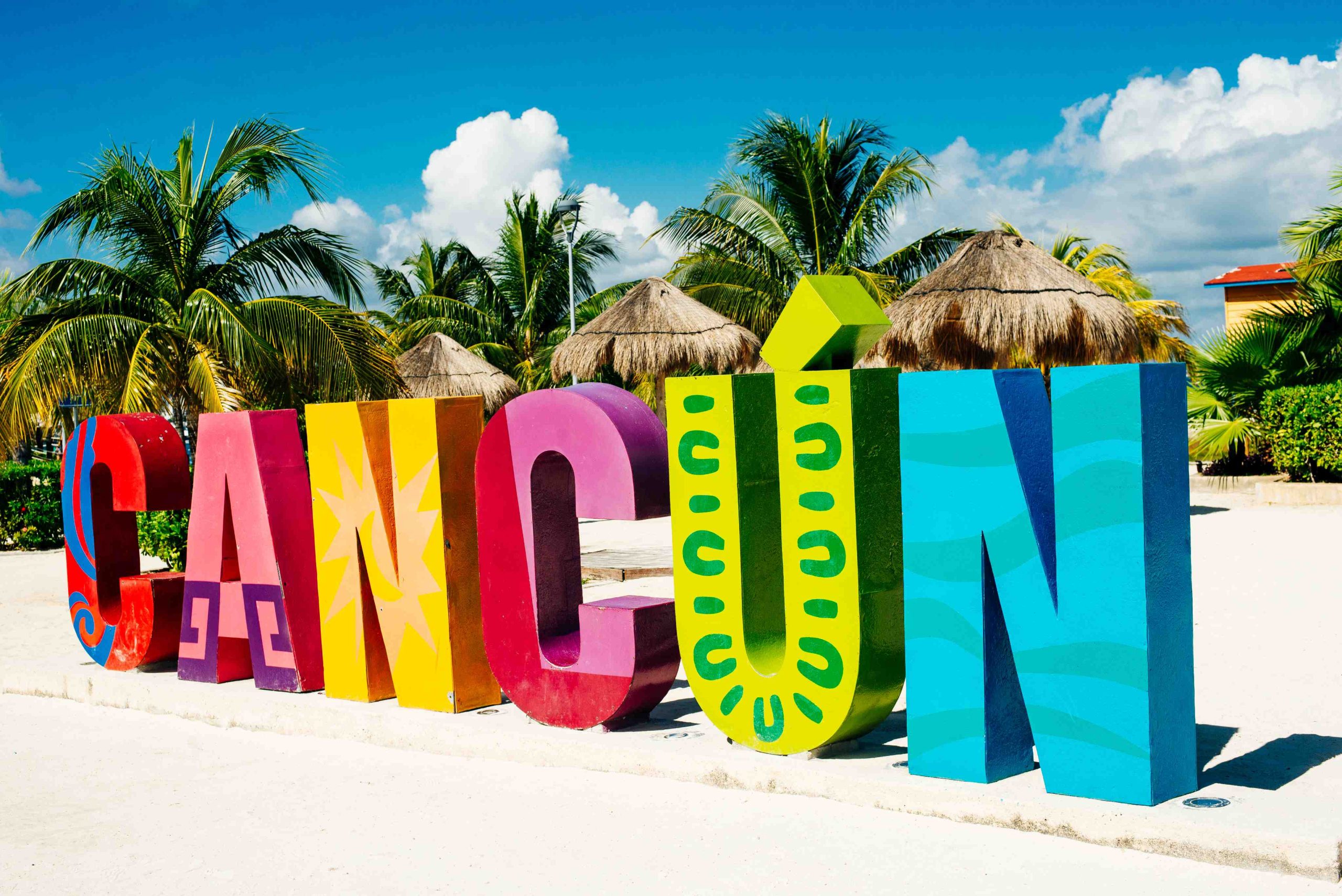cancun-quintana-roo-mexico-december-2019-cancun-colorful-sign-by-blue-ocean-caribbean-touristic-spot